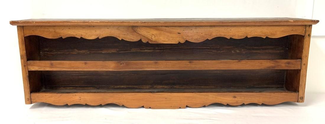 ANTIQUE FRENCH COUNTRY CARVED WOOD SHELF: Antique French country carved wood wall shelf. Measures a total of 46.75" wide, 14.75" tall, and 6" deep. Condition: minor wormage, scattered signs of wear and age, see images. Weight: 17 lbs.