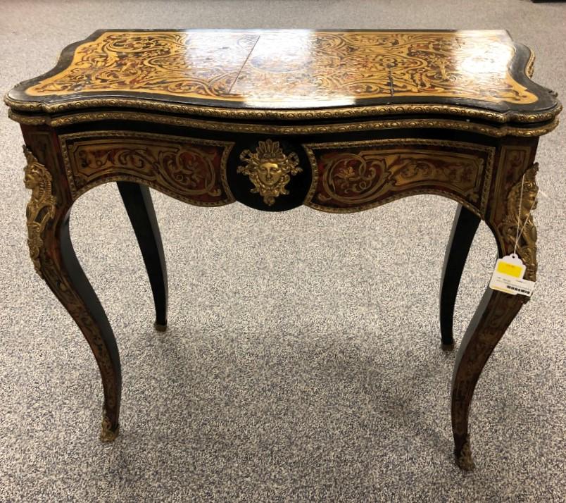 19TH C FRENCH NAPOLEON III BOULLE STYLE CARD TABLE: Antique French Napoleon III Boulle style marquetry inlaid card or game table. Top flips open and rotates crating a 35" x 34.5" playing surface. When open, the table height is 30" tall. Condition: scat
