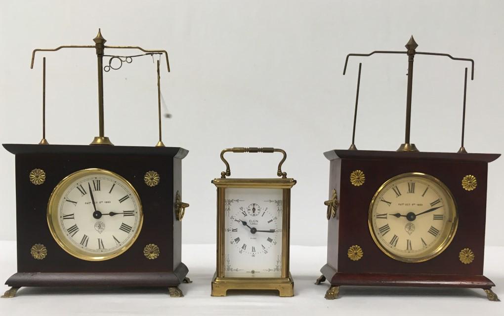 THREE VINTAGE CLOCKS: FRENCH CARRIAGE & HOROLOVAR: Lot of three antique clocks. Includes an Elgin French brass and glass carriage clock (4.6" tall x 2.1" wide), and two Jerome Co. Horolovar "Flying Pendulum" clocks. One of the Horolovar clocks is runn