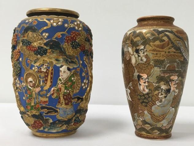 TWO JAPANESE MEIJI SATSUMA PORCELAIN VASES: Lot of two Japanese Meiji period Satsuma porcelain vases. One is decorated in relief with a blue ground color (7.5" tall), and the other is a thousand faces dragon vase (7.25" tall). Both are signed o