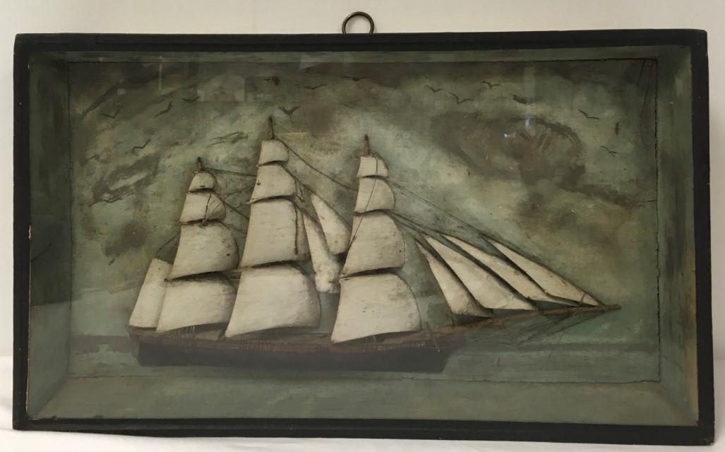 EARLY 19TH C CARVED FOLK ART SHIP DIORAMA: Early 19th century carved folk art ship diorama, under glass and measuring a total of 21.5" tall x 12.75" tall and 2.25" deep. "Cumberland: circa 1820. Condition: glass has been replaced, minor signs 