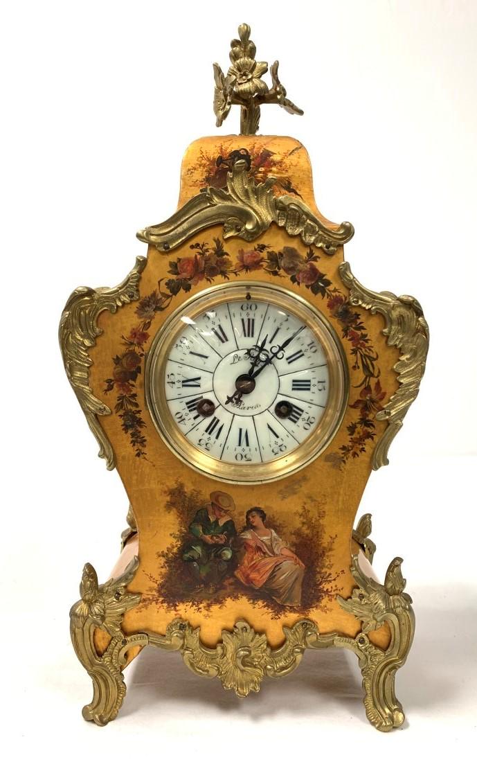 ANTIQUE FRENCH ROCOCO STYLE PAINTED MANTEL CLOCK: Antique 19th century French Rococo style painted wood mantel clock with ormolu mounts. Measures a total of 15.5" tall x 7.3" wide and 5" deep. Decorative enamel dial signed "Le Roy Paris", movement ma