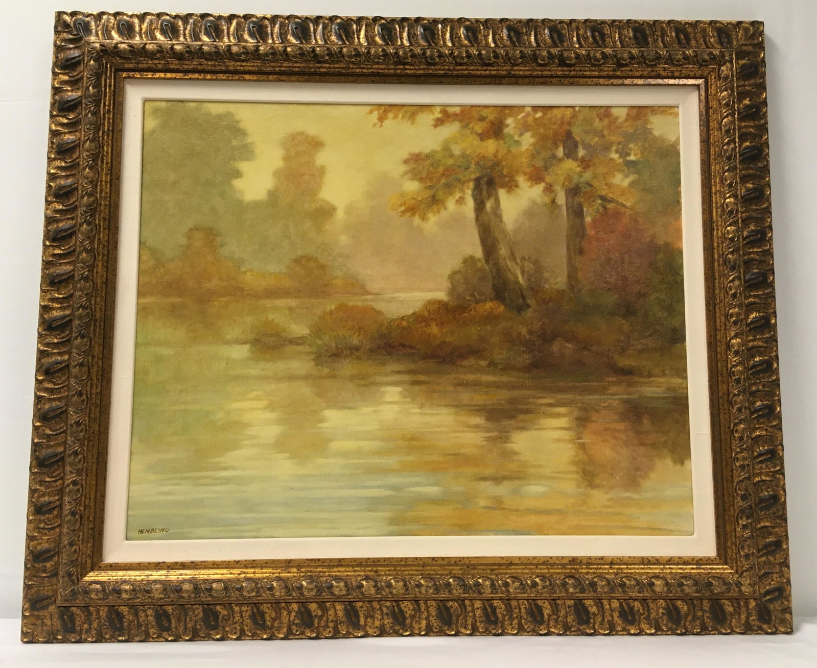 GUY HEMBLING OIL ON CANVAS LANDSCAPE PAINTING: Oil on canvas landscape scene painting by Guy Hembling. Signed lower left and framed in a gold tone frame measuring 33.75" tall x 39.5" wide. Condition: good, see images. Weight: approx. 25 lbs.