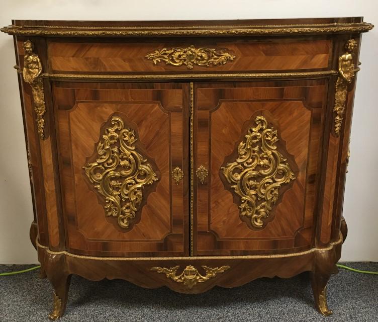 VINTAGE LOUIS XVI STYLE TWO DOOR BUFFET CABINET: An excellent quality vintage Louis XVI style two door buffet cabinet. Early to mid 20th century. Features extensive parquetry inlay and ormolu mounts, with a red velvet lined interior. Measures a tota