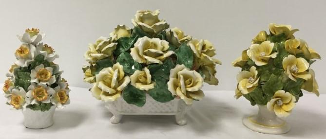 THREE ITALIAN CAPODIMONTE FLORAL CERAMIC CENTERPIE: Lot of three Italian Capodimonte floral ceramic bouquets or centerpieces. All three are signed on base/ Largest one measures 10" tall x 13" wide and 11" deep. Smallest is 8.25" tall x 5.5" wide. Condi