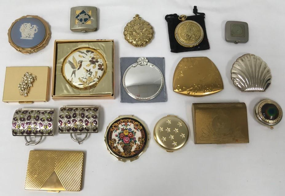 VINTAGE LADIES COMPACTS: STERLING, ETC. 17 PCS: Lot of vintage ladies compacts and more. Includes 14 compacts, a small mirror, and two Judith Leiber coin purses. The shell form compact is sterling silver and made by American Beauty, measures 2.75"