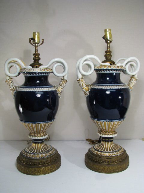 PAIR 19TH C MEISSEN URN LAMPS w SNAKE HANDLES: Pair 19TH century Meissen cobalt blue porcelain lamps with snake handles, gold gilt accents and dore bronze reticulated base. Without harps lamps measure 22" tall by 12" wide handle to handle. On one
