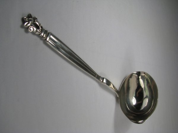 GEORG JENSEN STERLING SILVER LADLE 9 3/4": George Jensen sterling silver ladle. Stamped on the back of the ladle: Sterling, Denmark, Georg Jensen. Measures 9 3/4" long by 3 3/4" wide by 2 1/2" deep. Weighs 5 1/2 troy ounces. Condition is good,