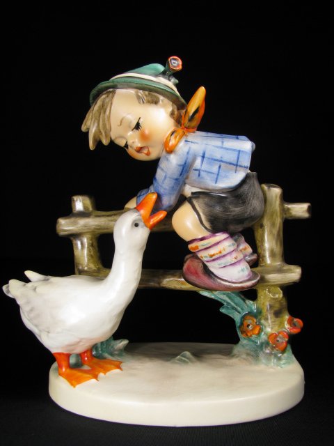 HUMMEL PORCELAIN FIGURINE "BARNYARD HERO" TM 4: Hummel porcelain figurine, "Barnyard Hero", impressed 195/1 with trade mark 4 stamped on base. Measures 5 3/4" tall. No chips, cracks. Minor crazing on base. See images. Approx. weight 11 ounces.