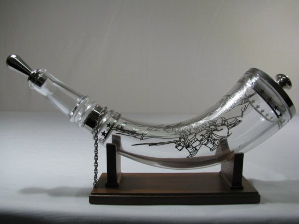 BACCARAT CRYSTAL POWDER HORN w SILVER OVERLAY: Baccarat crystal powder horn with sterling silver lid and silver overlay scene of Valley Forge, commemorating the American Revolutionary War. Baccarat hallmark is near the neck. Horn measures 11" long