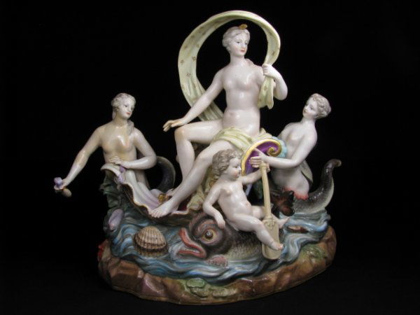 19TH CENTURY MEISSEN FIGURAL BIRTH OF VENUS: Mid to late 19th century Meissen figural group, Birth Of Venus. Venus is surrounded by cherubs, mermaid's and shells. Meissen blue under glaze crossed sword hallmark on base. Group measures 9" tall by