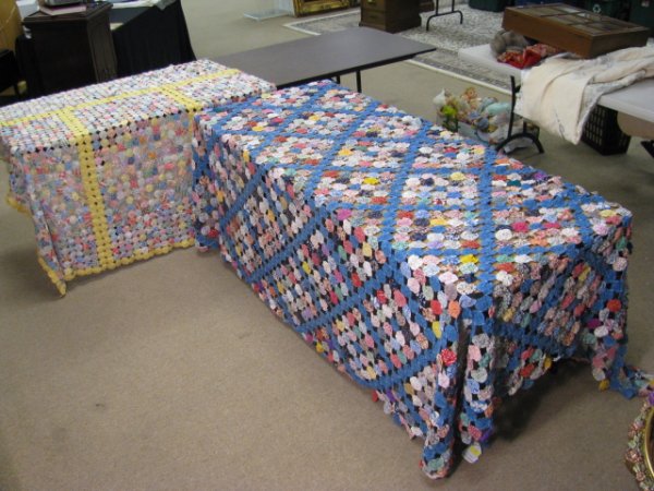TWO MULTI COLOR YOYO PATTERN QUILT TOPS: Two mid to late 20th century hand made multi color Yoyo quilt tops. First measures 8' 5" long by 7' wide. Second measures 5' long by 5' wide. Condition is good, see images. Approx. weight 7.6 lbs.
