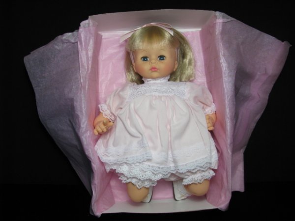 MADAME ALEXANDER DOLL: "PUSSY CAT" 3234: Madame Alexander soft body doll with vinyl limbs and sleep eyes "Pussy Cat" #3234 with Official Collector Registration #186583 MM and original box. Doll measures 13 1/2" long. Box measures 4 3/4" tall