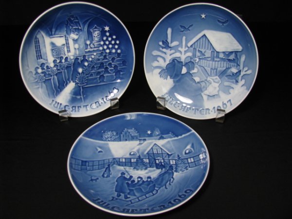 THREE BING & GRONDAHL CHRISTMAS PLATES 1967-1969: Three Bing and Grondahl Christmas plates made by Henry Theldander. They are: 1967 Sharing the Joy of Christmas, 1968 Christmas in Church and 1969 Arrival of Christmas Guests. The plates are in good co