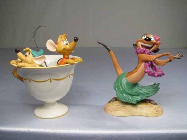 WDCC CINDERELLA GUS AND JAQ TIMON LUAU 2 PCS: Both of these Walt Disney Classics Collection porcelain figures are 4 1/2" tall. Boxes are 7 1/2" square. Total shipping weight is 1 lb 7 oz.