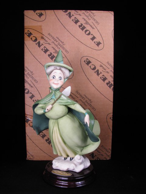 AUTHENTIC GIUSEPPE ARMANI ART DISNEY FAUNA FIGURE: Figure measures 8" tall x 4 1/2" wide. Boxed measures 6 1/2" high x 10 1/4" long x 6 1/4" deep. Total boxed weight is 1 lb 4 oz.