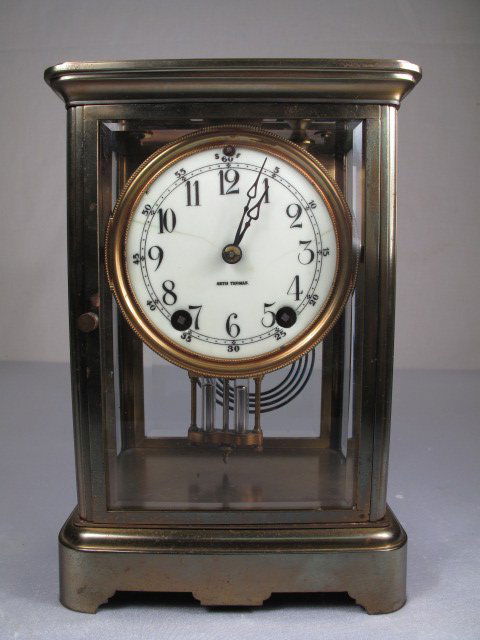 SETH THOMAS MERCURY PENDULUM CARRIAGE CLOCK: Seth Thomas Carriage clock. Time and strike. Enamel face with hairline at 10 and 3. Right beveled panel is broken at top. No key. Measures 6 3/4" long x 5 1/4" wide x 9 3/4" high. Weight is 8 lbs. 3 o