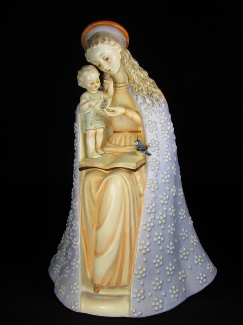 Large HUMMEL FIGURINE MADONNA AND CHILD: Hummel figurine Madonna and Child. Marked with Hummel stylized been hallmark and Western Germany. Condition good. Measures 11" high by 8" wide by 5 3/4" deep. Approximate shipping weight : 2.5 lbs. Se