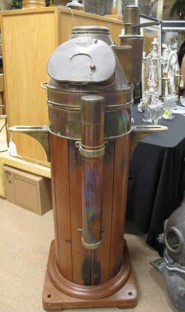 RICCARDO FERRO TEAK BRASS SHIPS BINNACLE COMPASS: Early 20th century teak wood and cast brass binnacle. Front plate stamped, Society Anonma Riccardo Ferro, Genova. Compass face marked Riccardo Ferro and Geneva. Overall height 52" tall and measuring 3