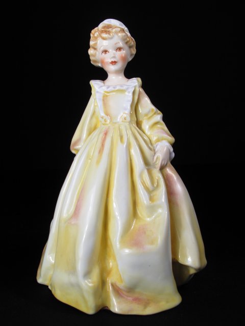 ROYAL WORCESTER FIGURINE GRANDMOTHERS DRESS: Royal Worcester porcelain figurine, Grandmother's Dress. Measures just over 6". Weight 0.7 lbs.