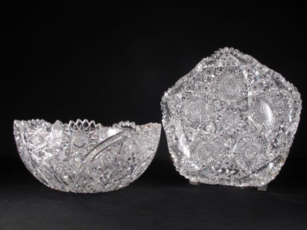 AMERICAN BRILLIANT CUT GLASS BOWLS 2 pcs: American Brilliant cut glass bowl, some tiny chips on rim. Measures 4" tall x 9" wide. Sold along with smaller bowl at 8 1/2" wide x 2 1/2" tall. Weight is 7 lbs 7 oz.