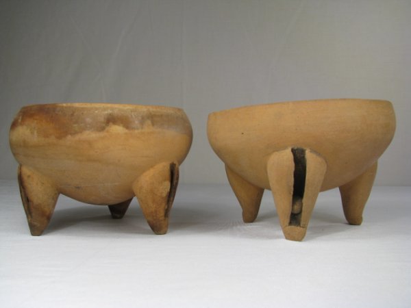 TWO ARTIFACT JUACAS CERAMIC BOWLS w PHOTOS: Two ceramic artifact Juacas bowls from an Indian dig in Panama May, 1962 with two small color photo's. Bowls have three legs with small little ceramic balls that move in each leg. Bowls measure 4 1/4"