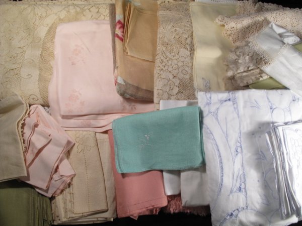 GROUP LOT VINTAGE ESTATE LINENS: Large lot of vintage estate linens to include, tablecloths, napkins, doilies, scarfs, runners, etc. All in good, clean and pressed condition. Shipping weight is 14 lbs 7 oz.