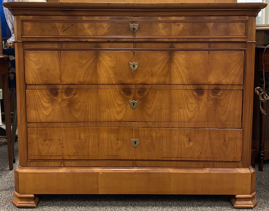REGENCY BIEDERMEIER STYLE BURLED PINE CHEST: Antique Regency period Biedermeier style burled pine five drawer chest. Lower baseboard molding is a hidden fifth drawer. Chest measures a total of 37.5" tall x 47" wide and 21" deep. Condition: very 