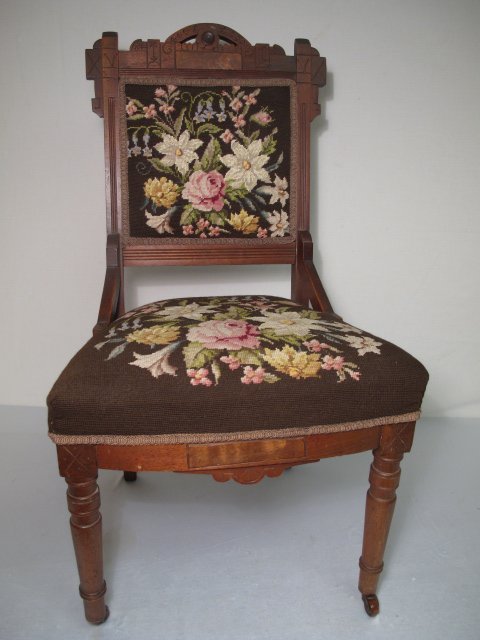 ANTIQUE AMERICAN EASTLAKE NEEDLEPOINT CHAIR FLORAL: Antique American Eastlake style side chair with floral needlepoint decoration, circa 1890. Height: 37". Width: 20 1/2". Weight: 18 lbs. Condition: Good with minor wear and tear.