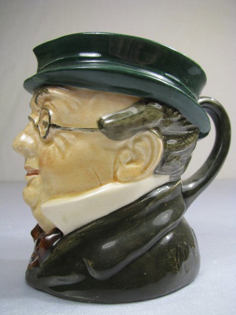 ROYAL DOULTON TOBY MUG: Royal Doulton A mark on bottom. Measures 4" tall x 4 1/4 long x 3" wide. Weight is 7 oz. Good condition.