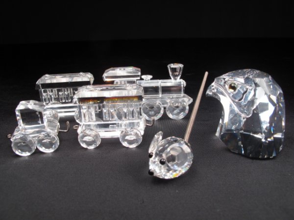 SWAROVSKI CRYSTAL EAGLE HEAD TRAIN MOUSE: Three pieces of Swarovski crystal. Bald Eagle head, limited edition figure measuring 2" tall, a miniature mouse measuring under 1/2" and a four piece locomotive train group measuring 7" in total. Weig