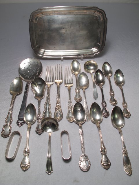20 PIECES STERLING SILVER FLATWARE TRAY MOST ANTIQ: Twenty pieces of sterling silver including: 6 antique matching teaspoons (5 3/4"); a rectangular serving tray (9" x 6"); Frigast, Denmark sterling pierced serving spoon (8 1/2"); two sterling napkin r