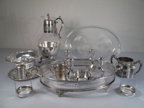ROGERS REED & BARTON ETC SILVERPLATE 8 PCS: 8 pieces of assorted silver plated items to include Reed & Barton candelabra, glass lined casserole dish, glass coffee pot on silver plate base, small cup and two handled sugar bowl. Tallest piece is