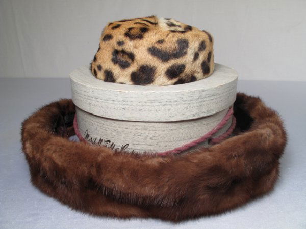 MARSHALL FIELD LEOPARD HAT MINK COLLAR: Marshall Field & Company leopard skin pill box hat measuring 7 1/2" wide x 2 12" tall sold along with a mink collar measuring 32" long. Both in good condition. Nested together in an original Marshall