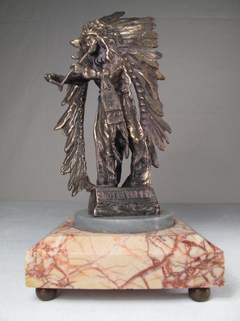 CARL KAUBA BRONZE "SHOT IN THE EYE" SIGNED: Carl Kauba design bronze of a native American titled, "Shot in the Eye". Facsimile signature of the artist. Late 20th Century. Veined marble base. Height: 8". Width of base: 5". Weight: 3.1 lbs. Condi
