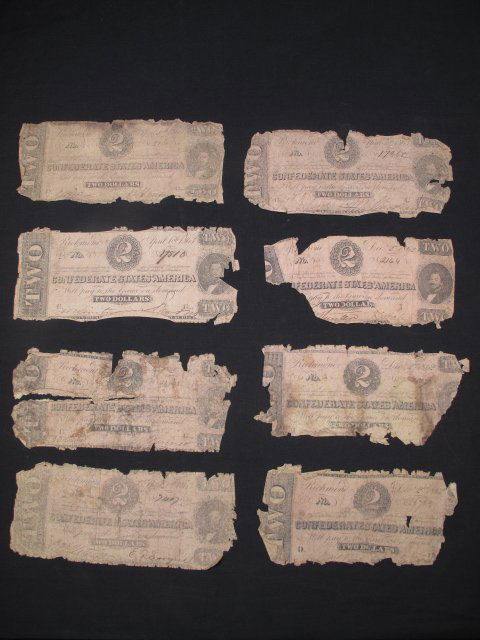 EIGHT CONFEDERATE STATES TWO DOLLAR BILLS 1862-63: Eight Confederate States American Civil War era two dollar bills printed between 1862 and 1863. Each bill measures approximately 6 1/2" by 3". Condition: Bills are worn, creased, and faded, some with