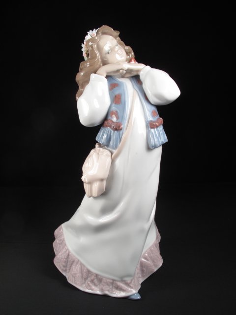 LLADRO PORCELAIN FIGURE GIRL WITH BIRD #6401 BOXED: Lladro porcelain figurine of a girl with a bird on her shoulder. Model #6401. Height: 9 3/4". Width: 5". Weight: l.3 lbs. Condition: Good with original box.