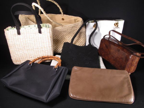 8 PCS ASSORTED LADIES HANDBAGS CURRENT AND VINTAGE: Group includes two Anne Klein clutch bags, two straw bags, mesh bag, fabric bag, leather bag and vintage patent leather bag. Largest measures 12" tall x 16" wide and smallest is 5" tall x 8" wide. Goo