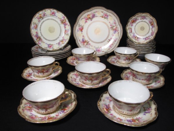 ANTIQUE PARTIAL AUSTRIAN PORCELAIN DESSERT SET: Part dessert set comprising 30 pieces of antique porcelain including: 7 saucers ( 5 1/2" dia.); 8 cups (dia. 4 1/2"); 8 berry bowls (5 1/2" dia.); 6 dessert plates (7 1/2" dia.) and 1 pie plate (9 1/2