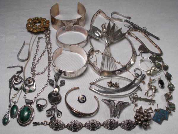 LADIES STERLING SILVER JEWELRY HASKELL MEXICO ETC: Selection of ladies jewelry, mainly sterling with other materials. Also included is a gold colored and faux pearl brooch by Miriam Haskell. Total approximate troy weight: 5.5 ozt. Condition: good.