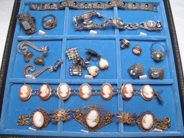 VINTAGE JEWELRY STERLING SILVER CAMEO MARCASITE: Vintage costume jewelry including a sterling silver and marcasite bracelet, two cameo bracelets and a selection of ear studs. Various styles and materials. Total weight: 0.8 lbs. Condition: good. One 