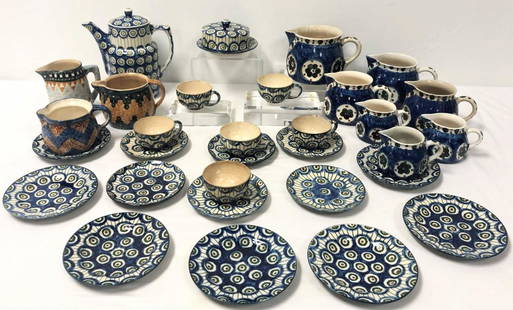 BUNZLAU JULIUS PAUL SAXON STONEWARE POTTERY: 31 PC: Large lot of Bunzlau Julius Paul Saxon Mountain stoneware pottery dinnerware. Includes a 9.5" tall teapot, a 3.5" tall pitcher (chips to rim), (2) 4.1" tall pitchers (one with hairlines and chip to