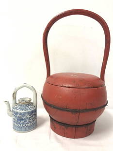 CHINESE WOOD BOX & MINI STRAITS PORCELAIN TEAPOT: Chinese lot including a red lacquer wooden covered box with handle, measuring a total of 14.75" tall, and a miniature Qing Dynasty Straits porcelain teapot, 5.8" tall. Condition: minor signs of