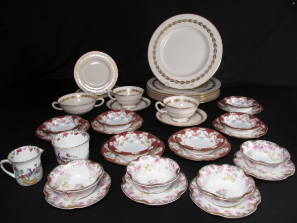 GROUP OF LENNOX AND LIMOGES PORCELAIN 36 PIECES: Group of Lennox and Limoges porcelain dinner ware including 14 pieces of Lennox, 20 pieces of antique Limoges, and a Victorian English cream and sugar. Lot includes six Lenox cream and gold dinner pla