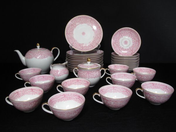 OLD BRUNSWICK "PARK LANE" PORCELAIN PART TEA SET: Thirty-seven piece porcelain pink seaweed or coral decorated part tea set by Old Brunswick, Germany, in the 'Park Lane' pattern comprising: 12 sandwich plates (dia: 7 3/4); 10 tea cups (dia: 3 3/4");