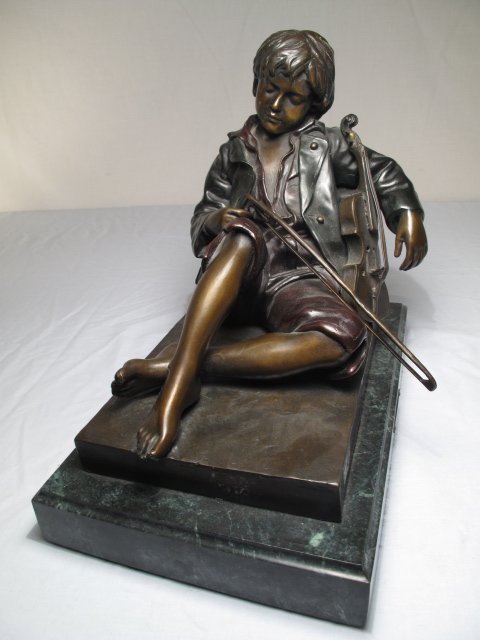 BRONZE SCULPTURE SLEEPING BOY VIOLINIST aft THAREL: Large bronze sculpture of a sleeping boy with violin on a black marble base. Applied patina in various dark colors. Probably later 20th century, After Léon THAREL (1858-1902) Signed, "Tharel". Height