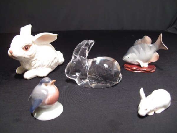 FIVE ANIMAL FIGURINES BOEHM COPENHAGEN DAUM B & G: Five animal figurines including a porcelain Boehm rabbit; a glass Daum rabbit; a Royal Copenhagen fish and rabbit; and a Bing and Grondahl bird. Boehm rabbit is 4 1/4" long and 3 1/4" tall. The smalle