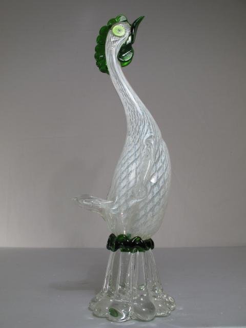 MURANO VENETIAN GLASS GREEN AND WHITE BIRD c1950s: Venetian glass green and white glass bird circa 1950s. Height: 17 1/2". Width at widest point: 5 1/2". Weight: 6.0 lbs. Condition: good.