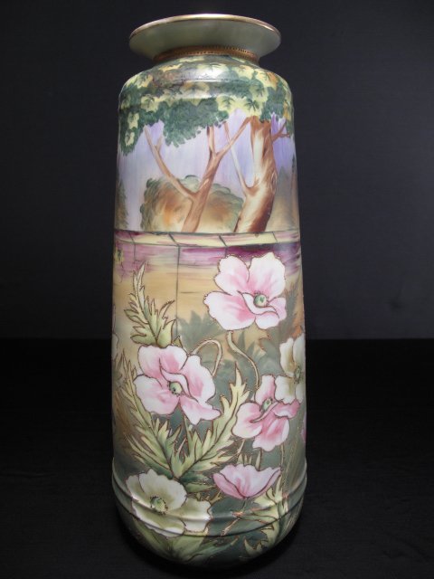 LG NIPPON HAND PAINTED VASE WITH POPPIES: Nippon hand painted vase with poppies in a garden. First quarter of the 19th Century. Partially gilded rims. Height: 14". Width at widest point: 6 1/4". Weight: 3.8 lbs. Condition: good with some wear