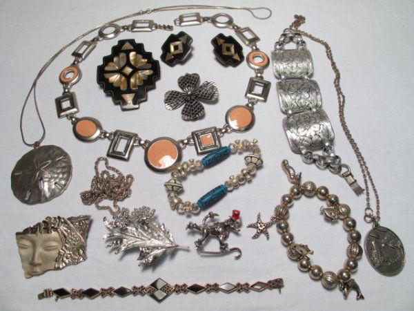 FOURTEEN PIECES VINTAGE & OTHER COSTUME JEWELRY: Over fourteen pieces of vintage and other costume jewelry, some signed, including a sterling silver onyx and marquesite Art Deco style bracelet and a large Trifari necklace signed by the designer. Var